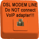 Telephone jack painted orange with label 'DSL MODEM LINE - Do NOT connect VoIP adapter'